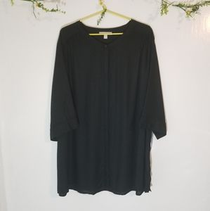 Woman within  black to with mandarin collard